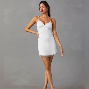 Lena white mini dress with Rhinestone Embellished Bust &
Rhinestone Fringe Hem
